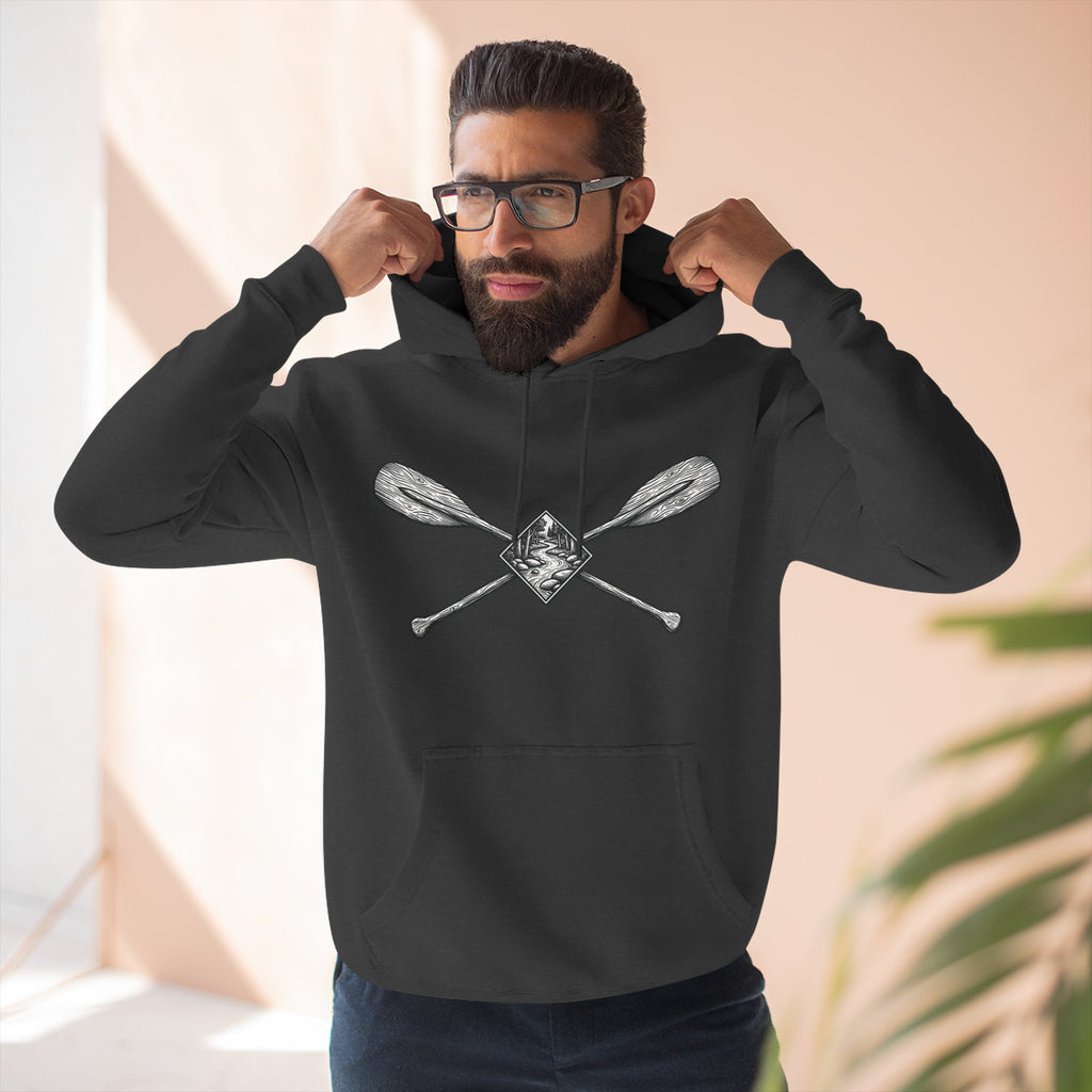 River Wanderer Premium Heavyweight Hoodie - Crossed Paddles Woodcut Design