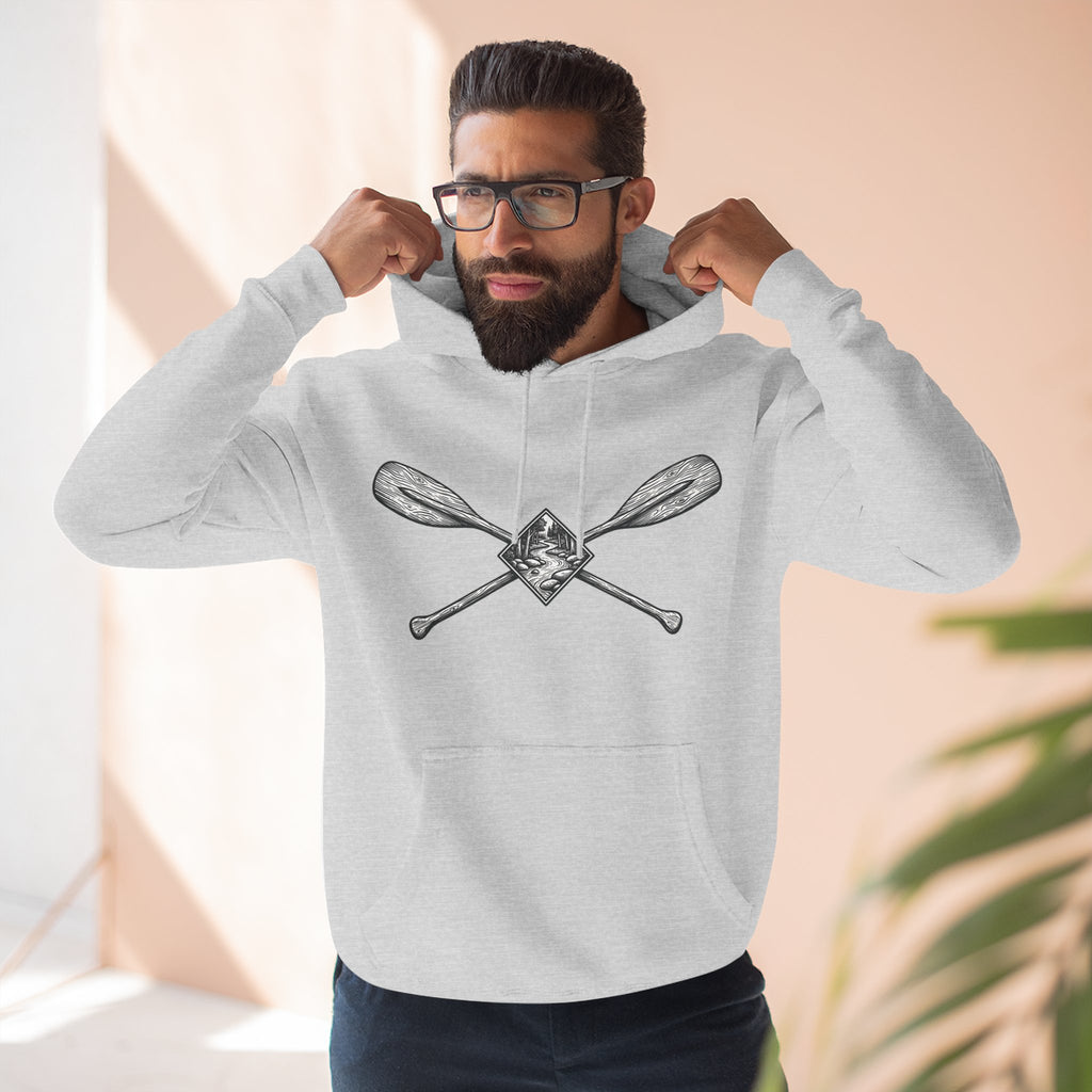 River Wanderer Premium Heavyweight Hoodie - Crossed Paddles Woodcut Design
