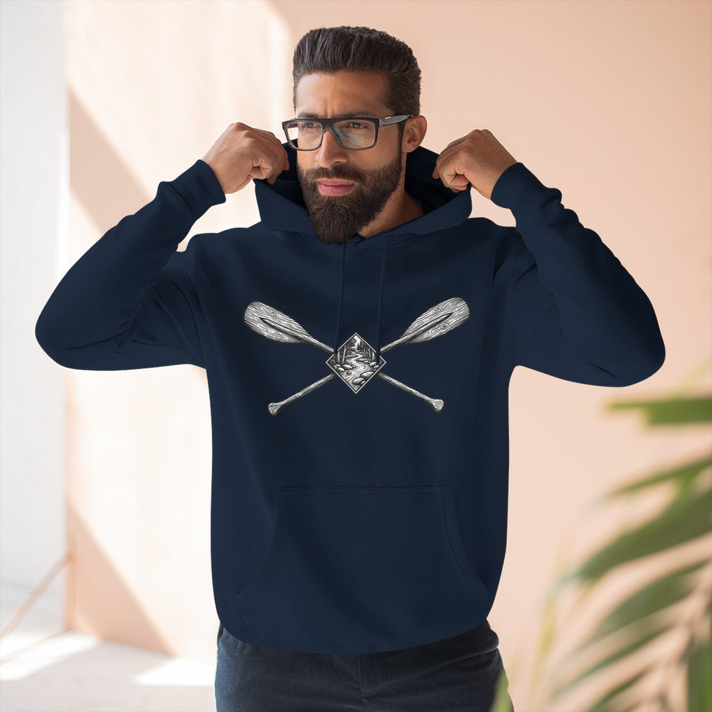 River Wanderer Premium Heavyweight Hoodie - Crossed Paddles Woodcut Design