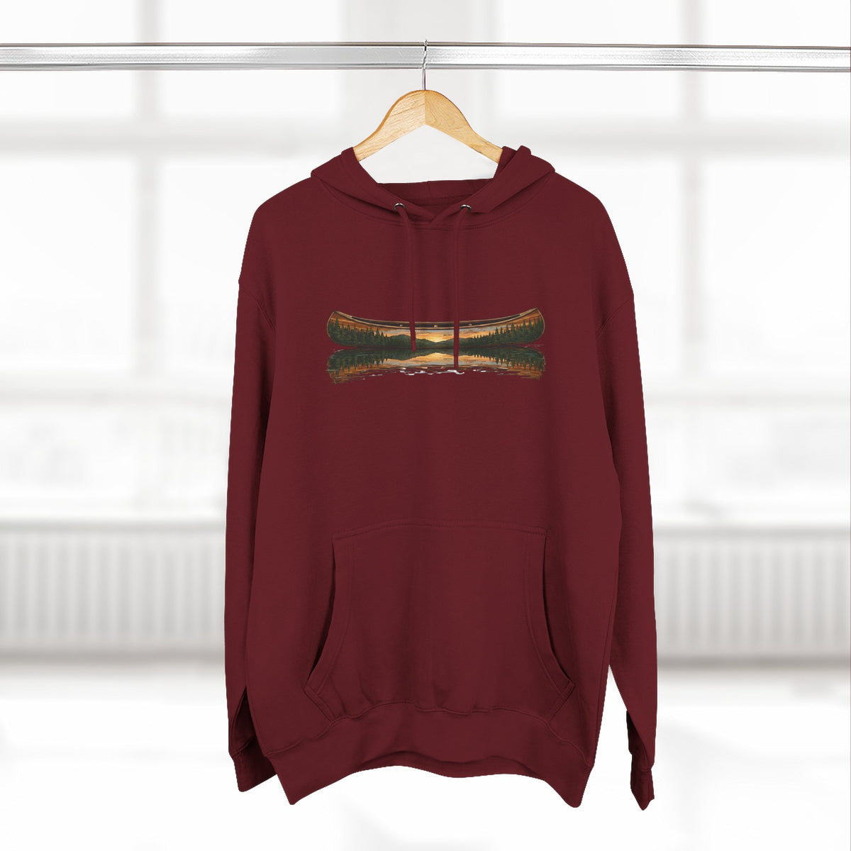 The "Morning Stillness" Premium Hoodie - Vintage Canoe Woodcut