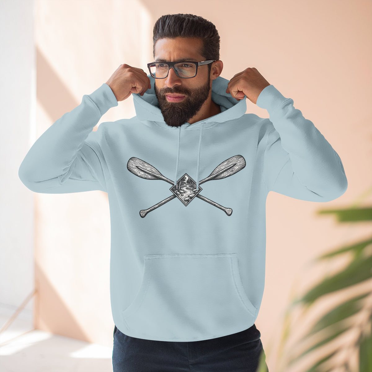 River Wanderer Premium Heavyweight Hoodie - Crossed Paddles Woodcut Design